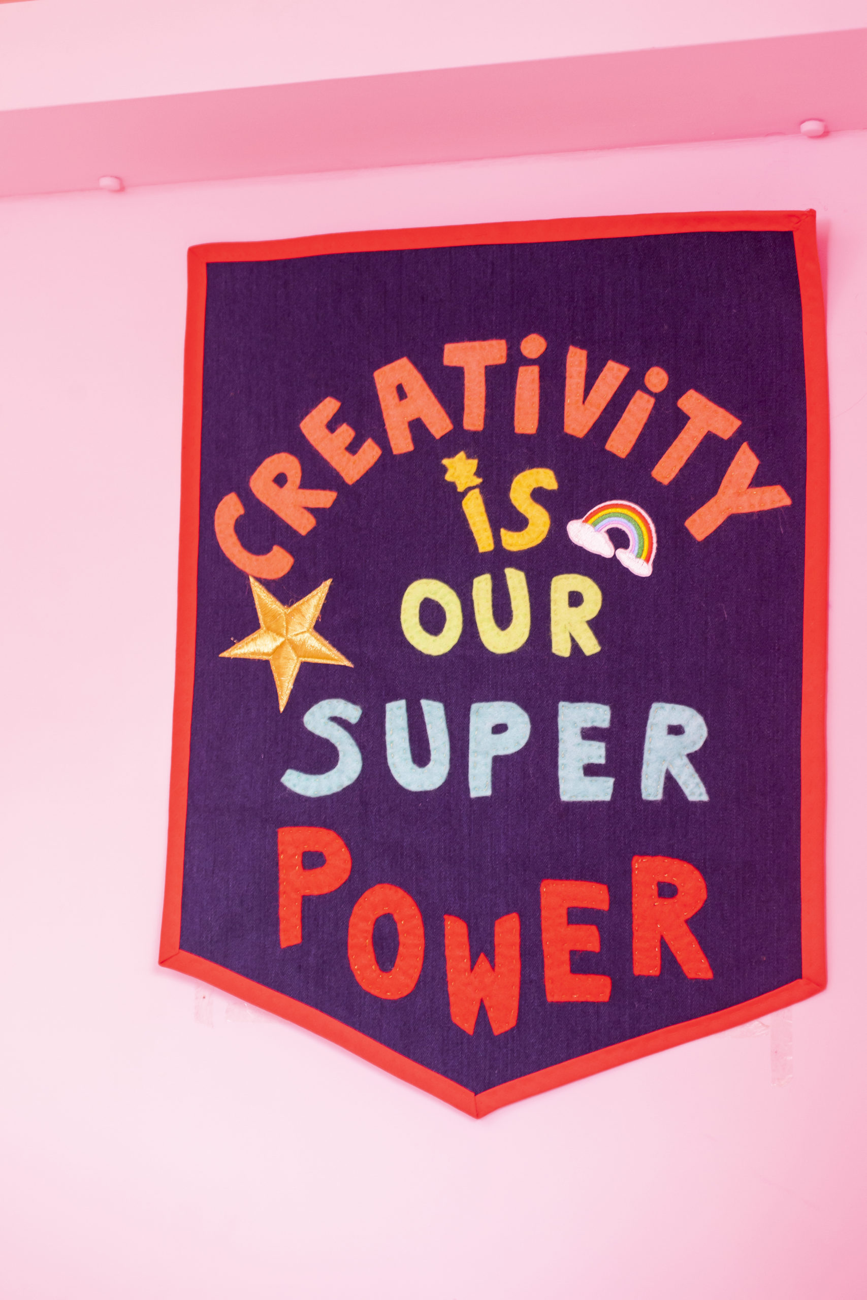 A banner that reads 'creativity is our superpower'